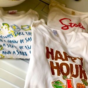 3 small/medium fun t shirts. Form fitting. All white